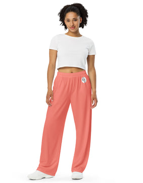 Peach colored All-over print unisex wide-leg pants