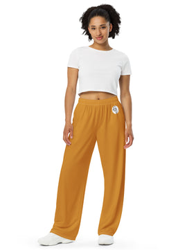 Mustard colored All-over print unisex wide-leg pants